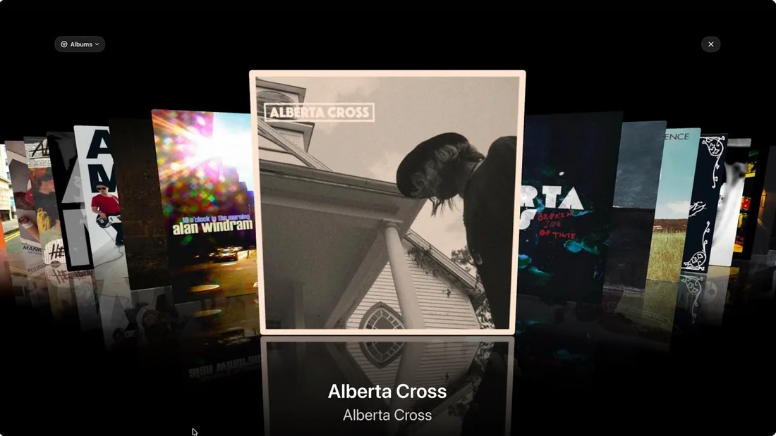 MusicCovered Apple TV CoverFlow browsing albums with reflections
